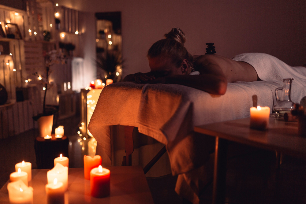Candlelit massage room creating a calm atmosphere