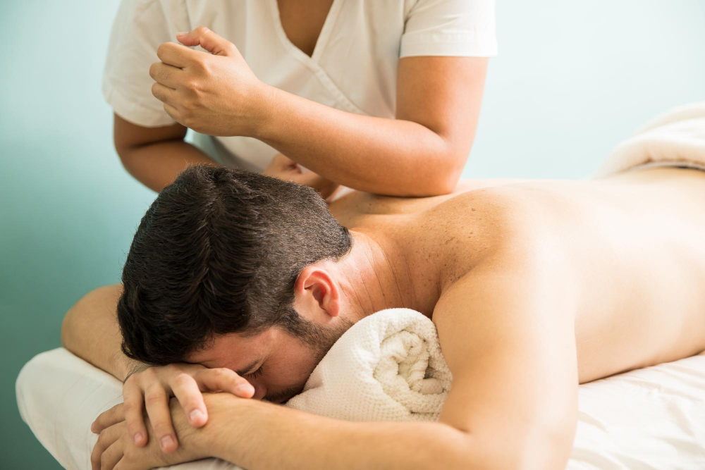 Traditional massage technique applied to the upper back